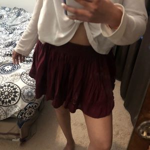 Maroon mini skirt fabric eyelet detail